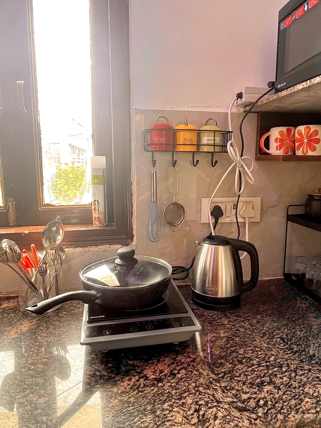 Induction cooking area and kitchen essentials